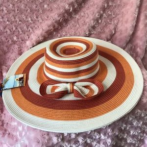 Wide brim beach straw hat by ANGELA & WILLIAM.